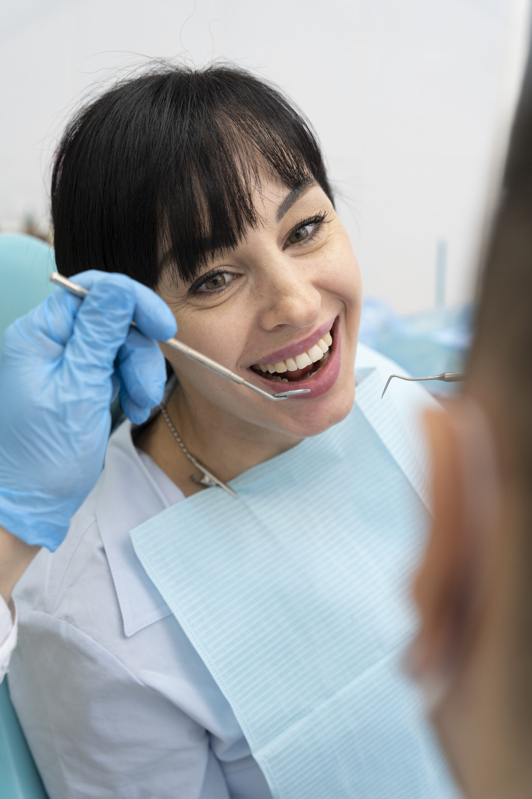 dentist-doing-check-up-patient (1)